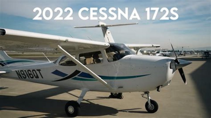 A Cessna 172 Skyhawk, complete with a Garmin G1000 Glass cockpit instrumentation, over mountains in the pre-alpha of Microsoft Flight Simulator. Captures in Sept. 2019 via Microsoft.