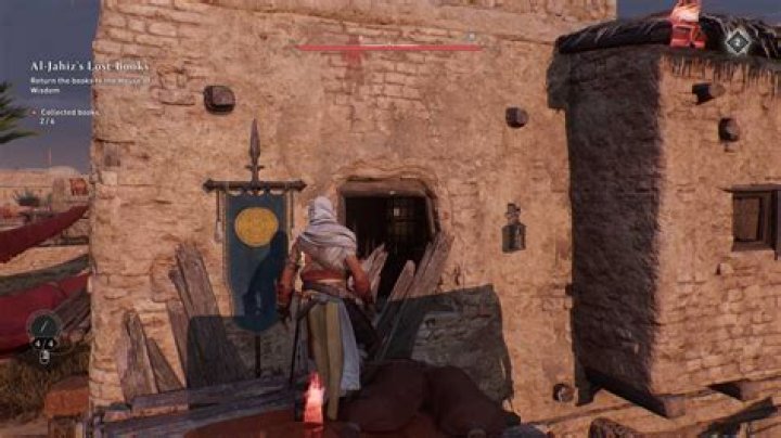 Basim aims a dagger through a window looking for a Gear Chest in AC Mirage.