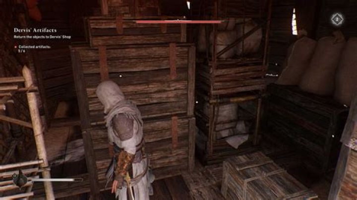 Basim moves crates around on a ship looking for Gear Chests in AC Mirage.