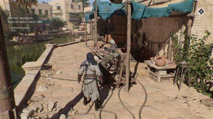 Basim sneaks up on a librarian with a key to a door near a Gear Chest in AC Mirage.