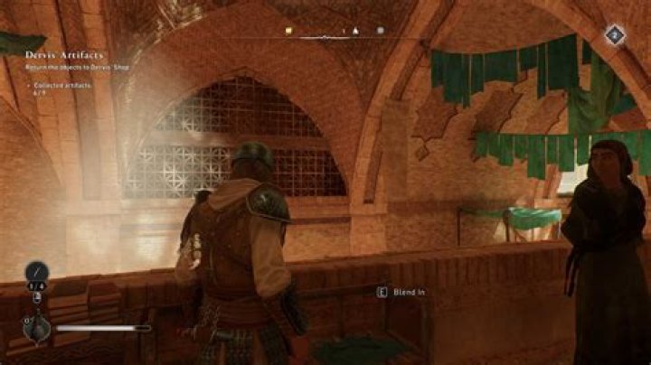 Basim stands on a banister while looking for the Grand Bazaar gear chest location in AC Mirage.