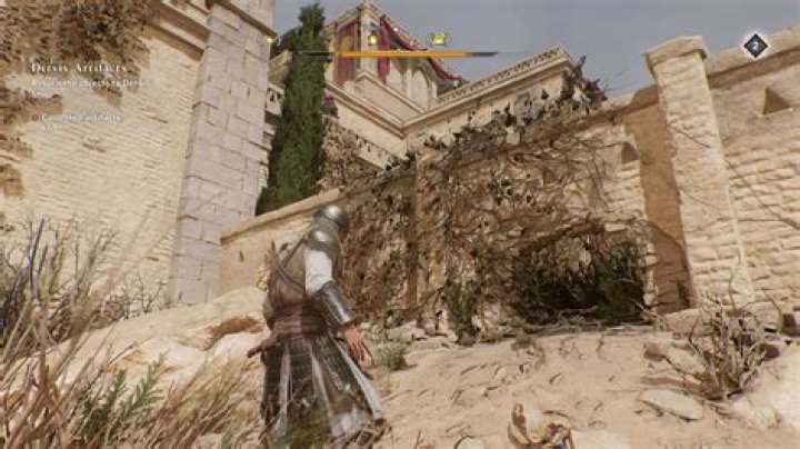 Basim stares at a castle with a Gear Chest location in Karkh in AC Mirage.