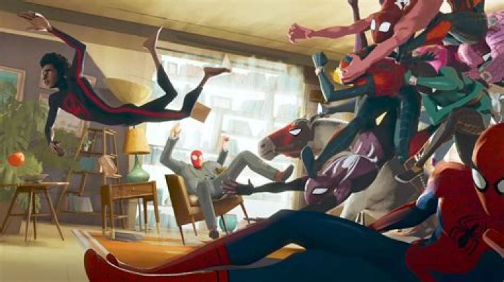 Miles Morales is chased by a team of Spider-Men through a psychiatrist&rsquo;s office in a still from Spider-Man: Across the Spider-Verse