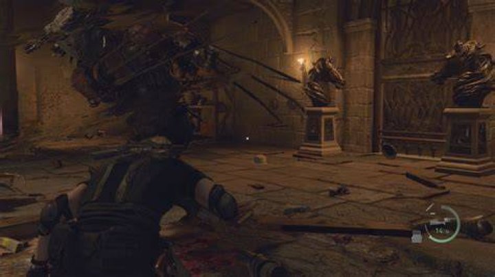 Resident Evil 4&nbsp;remake&nbsp;Leon ducking under a Garrador&rsquo;s attack
