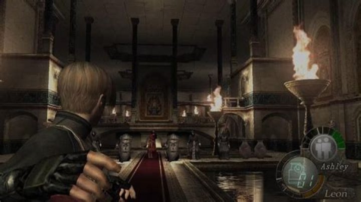 Resident Evil 4&nbsp;remake&nbsp;Leon getting attacked by a tentacle &mdash; a tail, actually &mdash; from under the floor