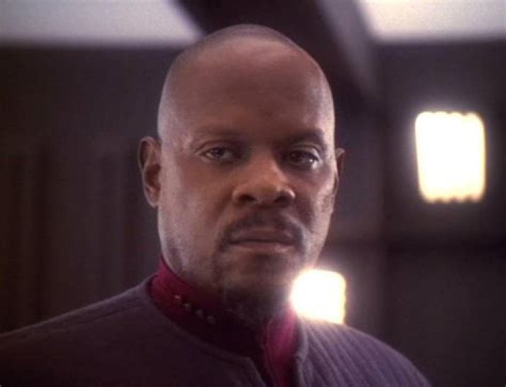 Sisko in his blue uniform in Star Trek: Deep Space Nine